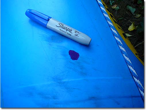 Blue marker used to color exposed scrim.